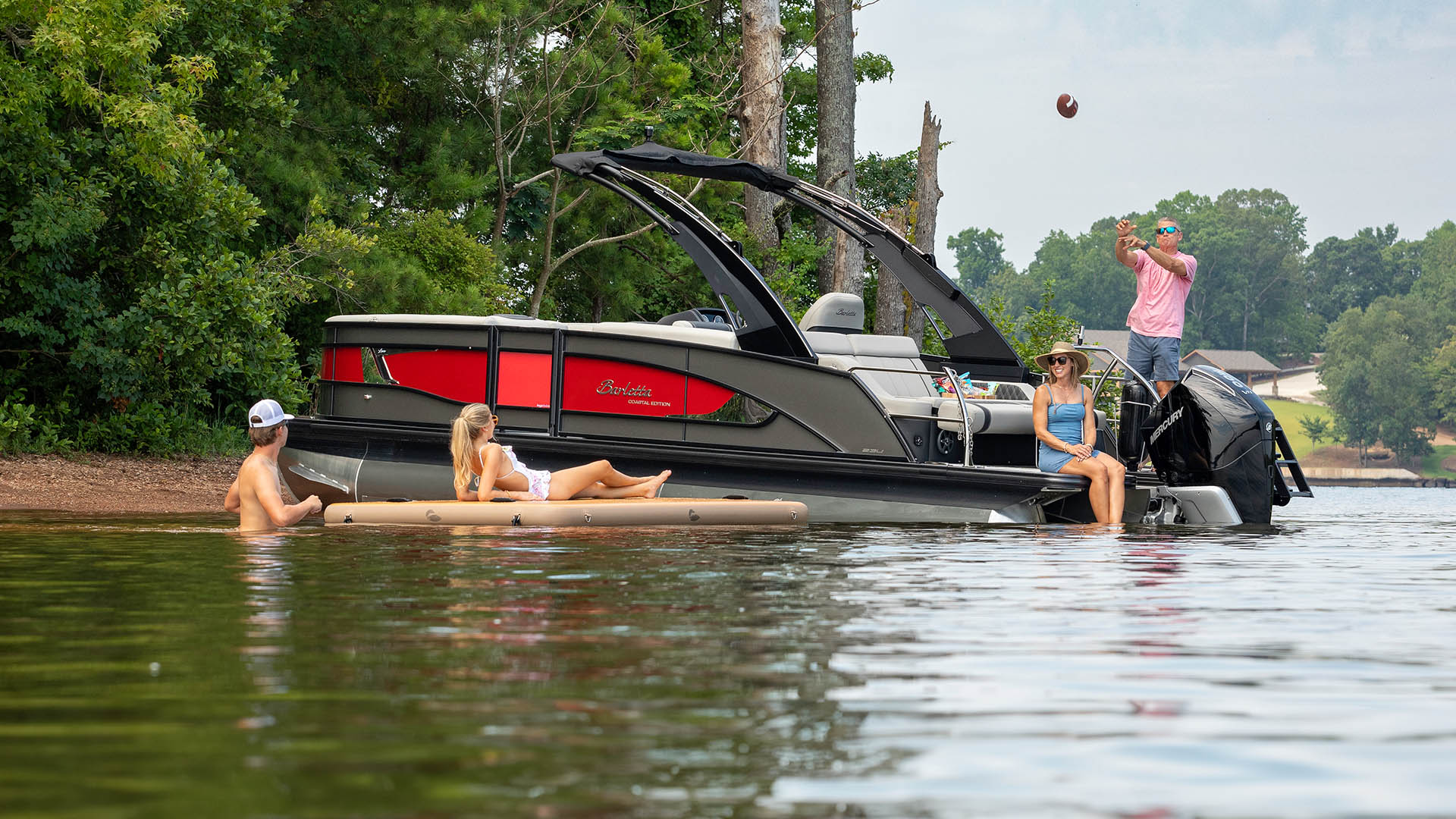 Barletta pontoon boat cruising on the water