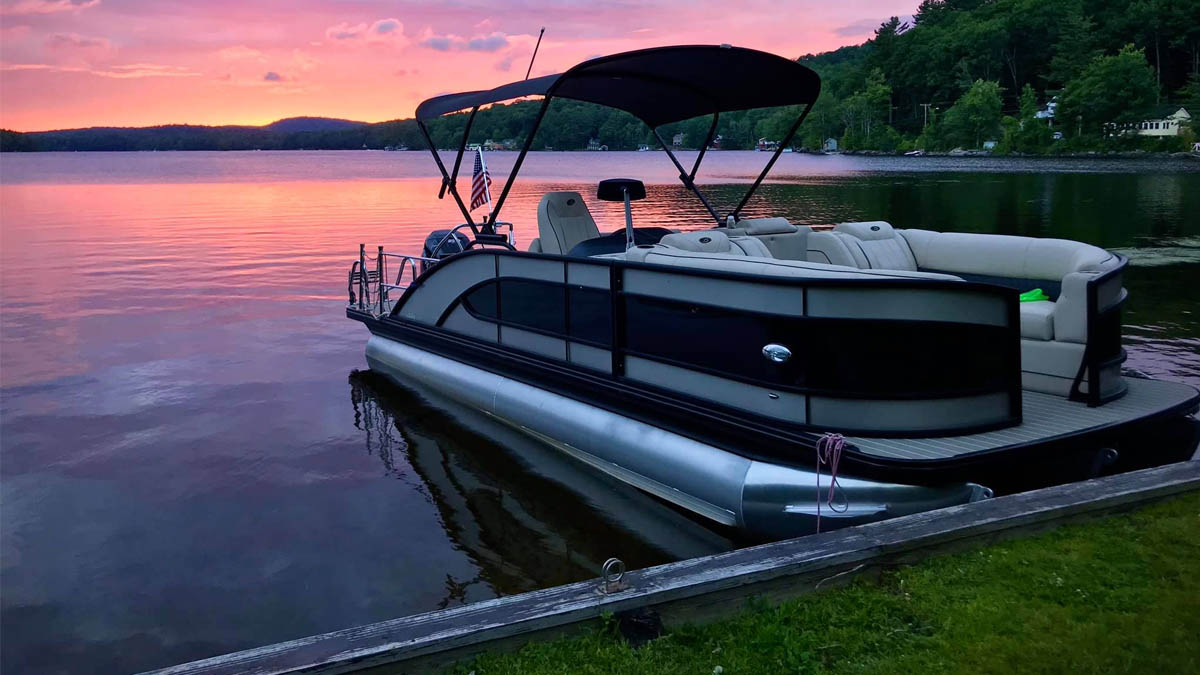 Boat on water with sunset